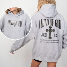 Child Of God Christian Hoodie Christian Hoodies Christian Streetwear Christian Merch Christian Apparel Bible Verse Hoodie Faith Based Hoodie  This unisex heavy blend hooded sweatshirt is relaxation itself. Made with a thick blend of cotton and polyester, it feels plush, soft and warm, a perfect choice for any cold day. In the front, the spacious kangaroo pocket adds daily practicality while the hood's drawstring is the same color as the base sweater for extra style points. .: 50% Cotton 50% Polyester .: Without Side Seams .: Drawstring Hood .: Spacious Pockets .: Medium-heavy fabric 8.0 oz. .: Classic fit .: Tear away label .: Runs true to size Care Instructions:  Machine wash: Wash inside out cold/warm (max 40C or 105F); Bleach as needed; Tumble dry: medium; Iron, steam or dry: low heat; Branded Hoodies, Christian Merch, Christian Streetwear, Branded Outfits, Christian Hoodies, God Christian, A Child Of God, Child Of God, Christian Apparel