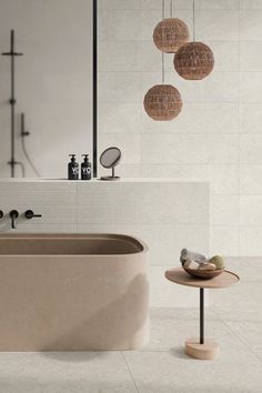 Bathroom with beige floor and wall tiles there is also a stone coloured bath and a shower behind Stone Floor Tiles, Real Wood Floors, Stone Floor, Inspiration Bathroom, Best Flooring, Tiles Wall, Bathroom Floor Tiles