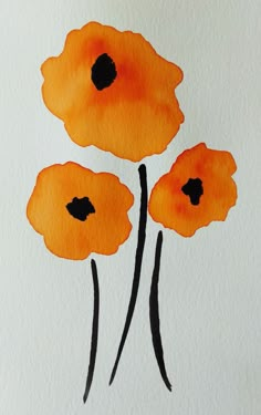 three orange flowers painted on white paper with black ink