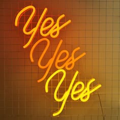 a neon sign that reads yes yes yes