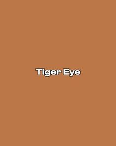 the words tiger eye are in white letters on an orange background, and there is a black