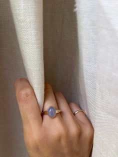 Simple blue Chalcedony stone set on 14k yellow gold. Metal: 14K yellow gold Stone: Blue Chalcedony Stone Shape: Oval Stone Size: 8mm x 10mm 1.4mm band width. Blue Chalcedony Ring, Chalcedony Stone, Chalcedony Ring, Gold Stone, Oval Stone, Blue Chalcedony, Stone Settings, White Gold Rings, Or Rose