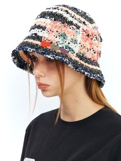 This is a comfortable and casual bucket hat that is made out of sturdy paper and cotton blend knit fabric. With a trendy and minimal design with bold stripe pattern and flower embroidery on the side, it gives a comfortable and casual look. - Paper yarn knit hat- Flower embellishments on the side- Bold stripe pattern Spring Cotton Beanie Hat, Casual Cotton Yarn Sun Hat For Spring, Summer Striped Cotton Hat, Casual Striped Brimmed Bucket Hat, Striped Cotton Casual Hat, Casual Cotton Yarn Bucket Hat, Casual Striped Bucket Hat With Curved Brim, Casual Striped Hats For Spring, Casual Cotton Crochet Hat With Curved Brim