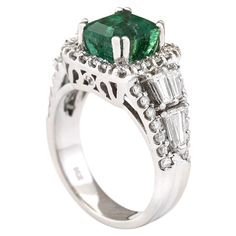 Stamped: 14K White Gold Total Ring Weight: 7.7 Grams Ring Length: N/ARing Width: N/A Gemstone Weight: Total Natural Emerald Weight is 2.65 Carat (Measures: 7.80x6.60 mm) Color: Green Diamond Weight: Total Natural Diamond Weight is 1.40 Carat Quantity: 48 Round-shaped and 6 Baguette Color: F-G, Clarity: VS2-SI1 Face Measures: 11.20x11.65 mm Sku: [703840W] Classic Multi-stone Princess Cut Rings, Elegant Emerald Cut Platinum Gemstone, Classic Princess Cut Multi-stone Rings, Luxury Emerald Ring With Accent Stones, Elegant Gia Certified Gemstones For Wedding, Luxury Emerald Ring With Baguette Cut And Accent Stones, Luxury Emerald Ring With Accent Stones Round Cut, Emerald-cut Multi-stone Diamond Emerald Ring, Emerald Cut Emerald Ring With Multi-stone Diamond