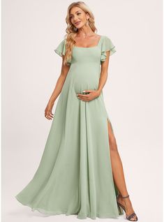 a pregnant woman in a green dress