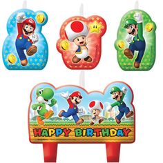 three candles with mario and luigi characters on them, one has a happy birthday candle