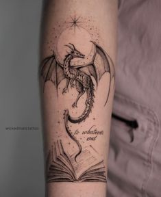 dragon tattoo Dragon Flying Up Tattoo, Dragon Tattoo Forearm Wrap, Inner Arm Dragon Tattoo, Dragon Feminine Tattoo, Fourth Wing Dragons Tattoo, Fine Line Dragon Tattoo Back, Castle And Dragon Tattoo, Eragon Saphira Tattoo, Wyvern Tattoo For Women