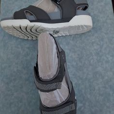 Ryka Brand, New, Never Used. Grey Velcro Closures For A Snug Fit. White Rubber Sole With Nice Support. Use For Hiking Or Walking The Boardwalk At The Beach. Gray Non-slip Open Toe Sport Sandals, Gray Open Toe Synthetic Sport Sandals, Gray Closed Toe Synthetic Sandals, Gray Synthetic Closed Toe Sandals, Gray Non-slip Synthetic Sandals, Women's Shoes Sandals, Snug Fit, At The Beach, Rubber Sole