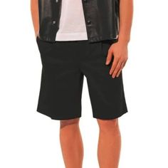 These Shorts From Prada's 2020 Spring And Summer Collection Are Made In A Black Sturdy Cotton, And Feature A Front 4-Button Fly With A Double Hook-Closure Bar, Belt Loops, A Pleated Waist, Front Slanted Pockets, Back Buttoned Welt Pockets, And A Bermuda Length. Condition: Great; Some Fading Throughout. Size: It 44 (Us 34) Approximate Measurements: Waist: 14.75" (37.5 Cm) Hips: 20.5" (52 Cm) Length (Inseam): 10" (25 Cm) Rise: 10.5" (27 Cm) Composition: Outside, Trouser Waistband, And Inside Pocket: 100% Cotton. Classic Black Shorts For Business Casual, Classic Black Business Casual Shorts, Black Summer Pants With Welt Pockets, Black Workwear Shorts With Welt Pockets, Black Bottoms With Welt Pockets And Straight Hem, Modern Black Shorts For Workwear, Modern Black Bottoms For Business Casual, Classic Black Summer Pants, Modern Black Workwear Shorts