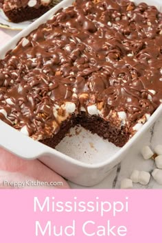 a close up of a cake in a pan with the words mississippi mud cake on it