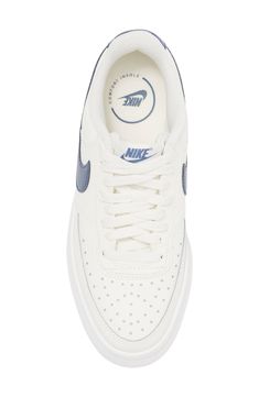 A court-inspired style goes street chic with a chunky platform in this leather sneaker built with foam cushioning, breathable perforations and padded tongue. 1 1/2" platform (size 8.5) Removable insole Leather upper/textile lining/rubber sole Imported White Chunky Sneakers With Perforated Toe Box For Sports, White High-top Chunky Sneakers With Perforated Toe Box, White High-top Platform Sneakers With Embossed Logo, White Sporty Platform Sneakers With Embossed Logo, White Low-top Platform Sneakers With Perforations, Nike Platform Sneakers With Boost Midsole For Streetwear, Nike Casual Sneakers With Embossed Logo, Low-top Chunky Sneakers With Perforations For Streetwear, Casual Nike Sneakers With Embossed Logo