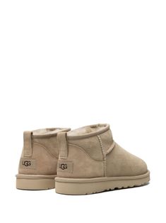 Find UGG Classic Ultra Mini Suede Boots on Editorialist. beige leather/wool appliqué logo round toe pull-tab at the heel slip-on style signature UGGplush™ lining rubber sole EVA outsole Beige Uggs, Ugg Beige, Coastal Closet, Uggs Ultra Mini, Uggs Mini, Mini Uggs, Good Fits, Ugg Ultra Mini, Shoes And Outfits