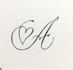 the letter ef is inscribed in cursive writing with a heart on it