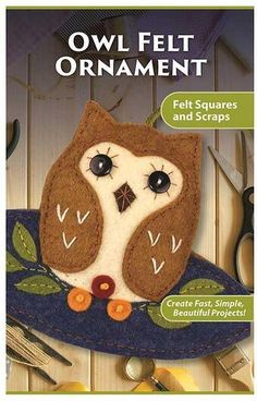 an owl felt ornament with scissors and thread