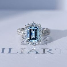 clio-https://clio.giliarto.com/ring/1/572 Center Stone Engagement Ring, Disney Engagement Rings, Aquamarine Ring Vintage, Halo Engagement Ring Emerald, Blue Diamond Engagement Ring, Aquamarine Birthstone, Moissanite Engagement Ring Halo, Blue Engagement Ring, Stone Engagement