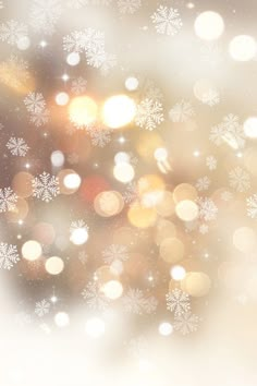 a blurry image of snow flakes on a white and brown background with boke