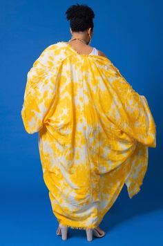 Experience the vibrant energy of summer with our Yellow Tie Dye kimono! Made with breathable fabric, this one-size-fits-most piece is perfect for any occasion. Versatile and comfortable, it's your go-to for effortless style all season long. One Size Long Cover-up For Day Out, Casual Spring Cover-up With Kimono Sleeves, Breezy Cotton Cover-up For Spring, Summer Wrap Cover-up Free Size, Spring Beach Cover-up Breezy Kaftan, Spring Cotton Beachwear Cover-up, Bohemian Cotton Cover-up For Day Out, Free Size Kaftan For Spring Beach Cover-up, Long Summer Cover-up With Relaxed Fit