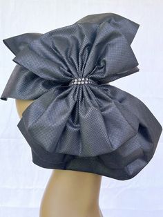 Embrace the essence of glamour with our exquisite 3 layer black bows, beautifully crafted with a 13in x 12in bottom black bow,  10in x 10in middle black bow and a chic 10in x 8in black bow artfully layered on top.  This captivating combination exudes elegance and allure, perfect for making a bold fashion statement.  Secured with a shimmering silver rhinestone closure, the design adds a touch of luxury to the ensemble.  Comfortably nestled on a 13in x 3/4in headband, our exclusive bows are though Elegant Formal Fascinator With Satin Bow, Elegant Black Bow With Tie Back, Elegant Fitted Fascinator With Ribbon, Elegant Black Bow For Wedding, Elegant Black Wedding Bow, Black Fitted Bow For Wedding, Formal Fascinator With Satin Bow, Detachable Black Bow For Wedding, Fitted Black Bow For Wedding