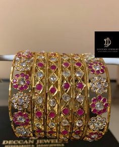 Ready to ship bangles Size 2.4 Not adjustable Made using high quality Cz polki , beads and 22 ct gold plating Delivered in 3-5 days within USA Red Kundan Bangle In Bollywood Style, Red Stone Work Bangle Jewelry, Traditional Ruby Bangle With Stone Work, Traditional American Diamond Bangle For Festive Occasions, Gold Kundan Bangle With Stone Setting, Celebration Kundan Bangle Hand Set, Red Kundan Bracelet With Stone Work, Hand Set Kundan Bangle For Celebrations, Ruby Bracelet With Stone Work For Gift