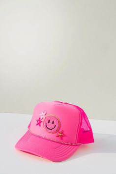 This colorful, preppy one-of-a-kind hat will make heads turn! The mix of smiley face and star patches bring big cheer and style to any outfit. Details: 100-percent polyester Adjustable back Designed in our Dallas creative studio Final sale Dimensions: Foam front high crown: 4" Preppy Bday Party, 8th Grade Aesthetic, Preppy Hats, Hat Band Ideas, Preppy Bday, Picnic Bday, Smiley Face Hat, Trucker Hat Ideas, Preppy Hat