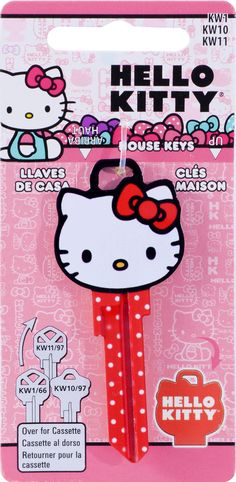 a hello kitty keychain with polka dots on it