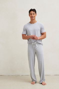 Introducing your stay at home uniform. Lounge in comfort all day in this incredibly soft and breathable pajama set. This set includes straight leg pajama pants and a matching raglan cut t-shirt. Made from our signature ultra-soft and moisture-wicking fabric blend. Made in Canada. 93% Viscose from Bamboo / 7% Spandex. Fits true to size. Available in S, M, L, XL. S (28-30), M (32-34), L (36-38), XL (40-42). Machine washable and dryer friendly. Lounge Wear Men, Pajama Men, Mens Pajama, Night Fits, Soft Pajama Pants, Mens Pajama Pants, White Pajamas, Mens Pajamas Set, Cut T Shirt