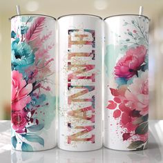 three personalized coffee mugs with flowers on them