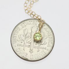 Very classy, simple, and dainty. This handcrafted gold pendant has a natural Peridot stone and comes on your choice of a 16 or an 18 inch gold chain with the artist's tag attached to the clasp. It can also be paired with other pendants! Mix and match to create your own personalized necklace or mother necklace! Gold is 14ky. Stone measures 3mm in diameter. Birthstone for August. All Laine Benthall jewelry comes with a lifetime warranty. This pendant can also be purchased without the chain, just g Nickel Free Yellow Gold Jewelry For May Birthstone, Nickel-free Yellow Gold Jewelry For May Birthstone, Nickel-free Yellow Gold May Birthstone Jewelry, Yellow Gold Peridot Necklace Gift, Nickel-free Gold Birthstone Necklace For May, Gold Peridot Round Pendant Necklace, Gold Necklace With Round Peridot Pendant, Classic Gold Jewelry With Peridot, Minimalist 14k Gold Charm Necklace With May Birthstone