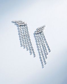 Suzanne Kalan Classic Diamond Angel Drop Earrings in 18k white gold Silver Baguette Cut Diamond Earrings For Formal Occasions, Luxury Diamond Earrings With Baguette Cut, Luxury Baguette Cut Diamond Earrings With Accents, Luxury Baguette Cut Diamond Earrings, Luxury Single Cut Diamond Drop Earrings, Luxury Drop Earrings With Single Cut Diamonds, Luxury Baguette Cut Diamond Earrings For Formal Occasions, Luxury Formal Baguette Cut Diamond Earrings, Luxury Platinum Diamond Earrings With Baguette Diamonds