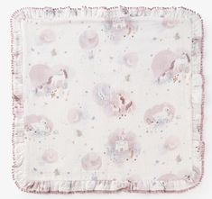 a pink and white blanket with an elephant design on the front, fringe trim around the edges