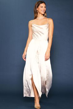 This strappy cowl-neck jumpsuit is a chic statement for this season's special occasions. It's got a beautiful drape up top and a breezy wide-leg silhouette. •Cowl neckline  •Adjustable spaghetti straps  •Pleated front  •Wide-leg silhouette  •Hidden zipper at back  Item Number: 74292 Satin Jumpsuit, Cowl Neck Top, Beautiful Drapes, Cowl Neckline, Shirt Top, Item Number, Cowl Neck, Hidden Zipper, Jumpsuits For Women