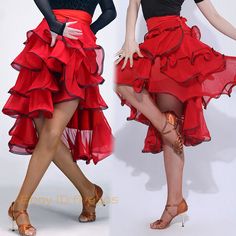 two women in red skirts and black tops