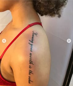 the back of a woman's shoulder with an inscription on it that says, you are