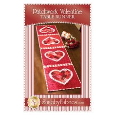 a table runner with hearts on it and the words, patchwork valentine table runner