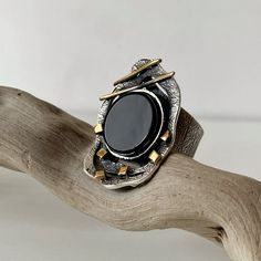 Round Black onyx ring sterling silver and 24 K gold plated, Black gemstone ring for women, textured band, an abstract ring made in Armenia All our jewelry is crafted with great attention to detail! We strive to provide you with the best quality, modern design, and perfect look!! All our jewelry is made of high-quality sterling silver and is stamped with a 925 stamp ◦* ◦* ◦* ◦* ◦* ◦* ◦* ◦* ◦* ◦* ◦* ◦* 【FULL DETAILS】 ► Gemstone: natural carborundum and pyrite ► RING Size: All sizes are available ( Modernist Gemstone Ring Jewelry, Modern Onyx Ring Gift, Modern Black Enamel Rings For Gifts, Unique Onyx Gemstone Rings, Black Enamel Metal Rings, Modernist Jewelry With Unique Design Open Ring, Modernist Ring Jewelry As Gift, Modernist Open Ring Jewelry Gift, Modern Jewelry Ring With Unique Design