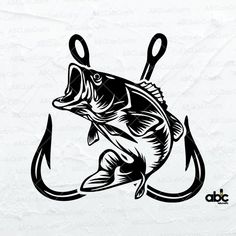 a fish with two hooks on it's hooks is shown in black and white