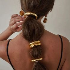 Introducing the Roxy Hair Tie - the perfect way to make a statement with your hair! Elevate your look with a touch of gold or silver, adding some pizazz to your locks. Who says hair accessories have to be boring? Go for the gold and stand out from the crowd! Style Ponytail, Diy Deodorant, Hair Tie Accessories, Hair Cuffs, Golden Hair, Cuff Jewelry, Natural Lip Balm, Hair Accessories Gift, Metal Hair