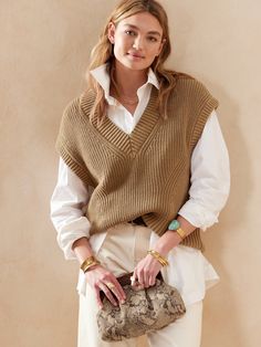 Dressing up or going casual, this sweater vest is ideal for days when the temperatures begin to climb.  Crafted from organic cotton in a timeless silhouette, this sumptuously soft fabric pairs perfectly over button-downs or informal t-shirts.  RELAXE Brown Sweater Vest Outfit, Vest Over Shirt, Norman Aesthetic, Country Vs Country Club, Vest Women Outfit, Amsterdam Fall, Vest Outfits Aesthetic, Sweater Vest Outfit Women, Vest Outfit Women