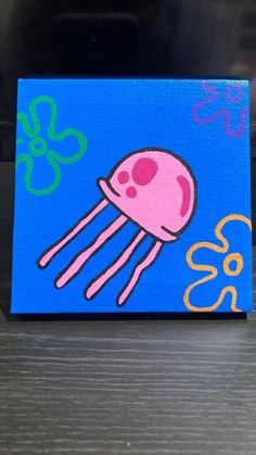 a painting of a pink jellyfish on a blue background with the word goo written below it