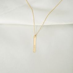 "Get her the 14k gold bar name necklace and let her know you would go the extra mile for her. It is perfect for engraving and is available in yellow or rose gold, or white gold. D E T A I L S * 100% 14k Solid Gold * Choice of Gold Color: Yellow Gold, Rose Gold, White Gold * Pendant Height: 25 mm/1 inch * Pendant Width: 4 mm/0.15 inch * Length: 14\", 16\", 18\", 20\", 22\" (Got a little note that can help you in the photos.) * Ready to Ship in 1-3 Business Days * 100% US sourced Got something you 14k Gold Jewelry With Engraved Text For Gift, Minimalist Gold Engraved Name Necklace, Minimalist Engraved Yellow Gold Bar Necklace, Minimalist Engraved Gold Name Necklace, Elegant Personalized Yellow Gold Bar Necklace, Gold Bar Necklace With Nameplate For Everyday, Minimalist Gold Nameplate Bar Necklace, Dainty 14k Gold Bar Necklace Gift, Everyday Gold Necklaces With Engraved Text