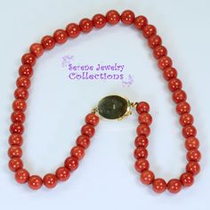 Simple and elegant Sardinia coral bead necklace with an 18k yellow gold clasp! Total Weight: 45.86 grams Necklace Length: 17 inch 18k gold clasp: 18.8mm x 13.7mm Precious Metal: 18k gold Precious stones: -Coral Round Beads: 8.1mm to 9mm diameter -Coral Faceted Oval: 12..3mm x 8.5mm Formal Coral Single Strand Beaded Necklace, Elegant Coral Hand-strung Necklaces, Elegant Hand-strung Coral Necklaces, Elegant Hand-strung Coral Necklace, Luxury Single Strand Round Beaded Necklace, Formal Single Strand Red Coral Necklace, Elegant Single Strand Red Coral Necklaces, Elegant Single Strand Red Coral Necklace, Elegant Red Coral Round Bead Necklaces