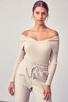 Sweater weather but make it chic. This piece features a thick ribbed material, off shoulder neckline with fold over detail, and snug fit. Pair with your favorite denim and tall booties to complete this fall look. "Open Shoulder Top" Ribbed Pullover off shoulder Rayon/Nylon Imported Hand wash Casual Ribbed Off-shoulder Top For Fall, Chic Fitted Off-shoulder Top For Fall, Trendy Off-shoulder Top For Fall, Fitted Chic Off-shoulder Top For Fall, Trendy Stretch Off-shoulder Top For Fall, Casual Off-shoulder Top For Winter, Casual Off-shoulder Stretch Top For Winter, Casual Stretch Off-shoulder Top For Winter, Chic Fitted Off-shoulder Top For Winter