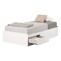 a bed with two drawers underneath it and a pillow on the top of the bed