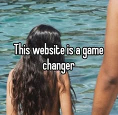 a woman sitting in the water with her back turned to the camera and texting, this website is a game changer