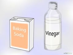 a bottle of baking soda next to a carton with the word vinegar on it