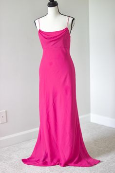 Turn heads with this stunning vintage Y2K hot pink floor-length dress, featuring an elegant cowl neckline. This dress combines bold color with timeless style, perfect for formal events, proms, or glamorous nights out. Embrace the captivating charm of early 2000s fashion with this vibrant and sophisticated piece. Add this breathtaking vintage gown to your collection for a show-stopping look and unforgettable elegance. Listed as a size 2. Message for measurements. Hot Pink Formal Dresses, Y2k Formal Dress, Y2k Formal, Early 2000s Fashion, Pink Formal Dresses, Vintage Gowns, Cowl Neckline, Floor Length Dresses, Vintage Glamour