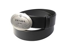 This classic Prada belt features a matte silver oval buckle with Prada Milano logo engraved. Constructed with saffiano cross-grain leather, this belt is practical for everyday wear.       Model: 2CM046    Blue Saffiano Leather  Brushed matte silver oval buckle  Size: 95/38    Height: 1.75  Includes Prada dust bag and authenticity cards  Made in Italy Leather Business Belt With Metal Logo, Business Leather Belt Buckles With Metal Logo, Leather Belt Buckles With Metal Logo For Business, Silver Leather Belt With Logo Plaque, Leather Belt Buckle With Logo For Business, Leather Belt Buckles With Logo Plaque For Business, Leather Belt Buckles With Logo For Business, Classic Leather Belt With Silver-tone Logo Plaque, Modern Leather Belt Buckle With Logo Plaque