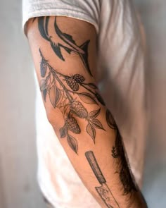 a man with a tattoo on his arm