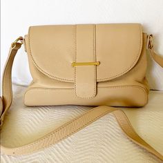 New Without Tags Leather Outer And Strap Cotton Lined Interior Beige Flap Bag With Adjustable Strap For On-the-go, Versatile Beige Crossbody Flap Bag, Beige Crossbody Flap Bag For Shopping, Cream Crossbody Flap Bag For Everyday, Beige Flap Satchel With Adjustable Strap, Beige Crossbody Flap Bag With Adjustable Strap, Chic Beige Flap Shoulder Bag, Beige Flap Bag With Adjustable Strap, Beige Crossbody Flap Bag For Everyday Use