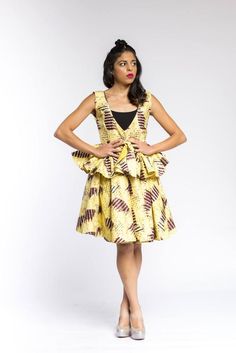 A cotton skirt set. Fitted Cotton Dress With Pleated Skirt, Knee-length Cotton Dresses With Pleated Skirt, Fitted Cotton Tiered Skirt, Spring Ruffled Peplum Sets, Cotton Flared Dress With Ruffled Skirt, Fitted Cotton Sets With Ruffles, Fitted Ruffle Cotton Skirt, Cotton Fitted Skirt With Ruffles, Chic Multicolor Cotton Skirt